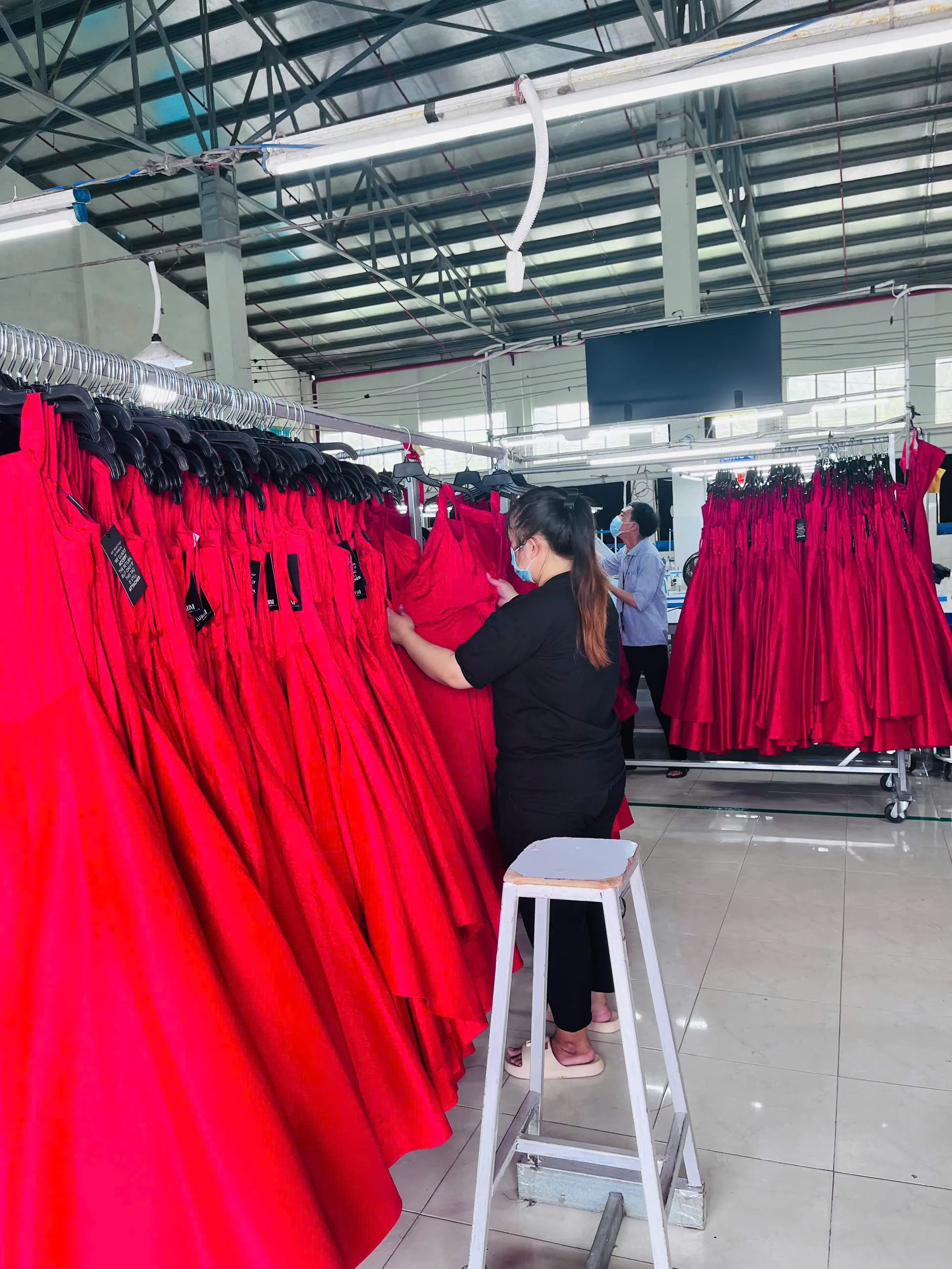 Inspectors verify workmanship, measurements, labels, colors, quantities, and overall garment quality.